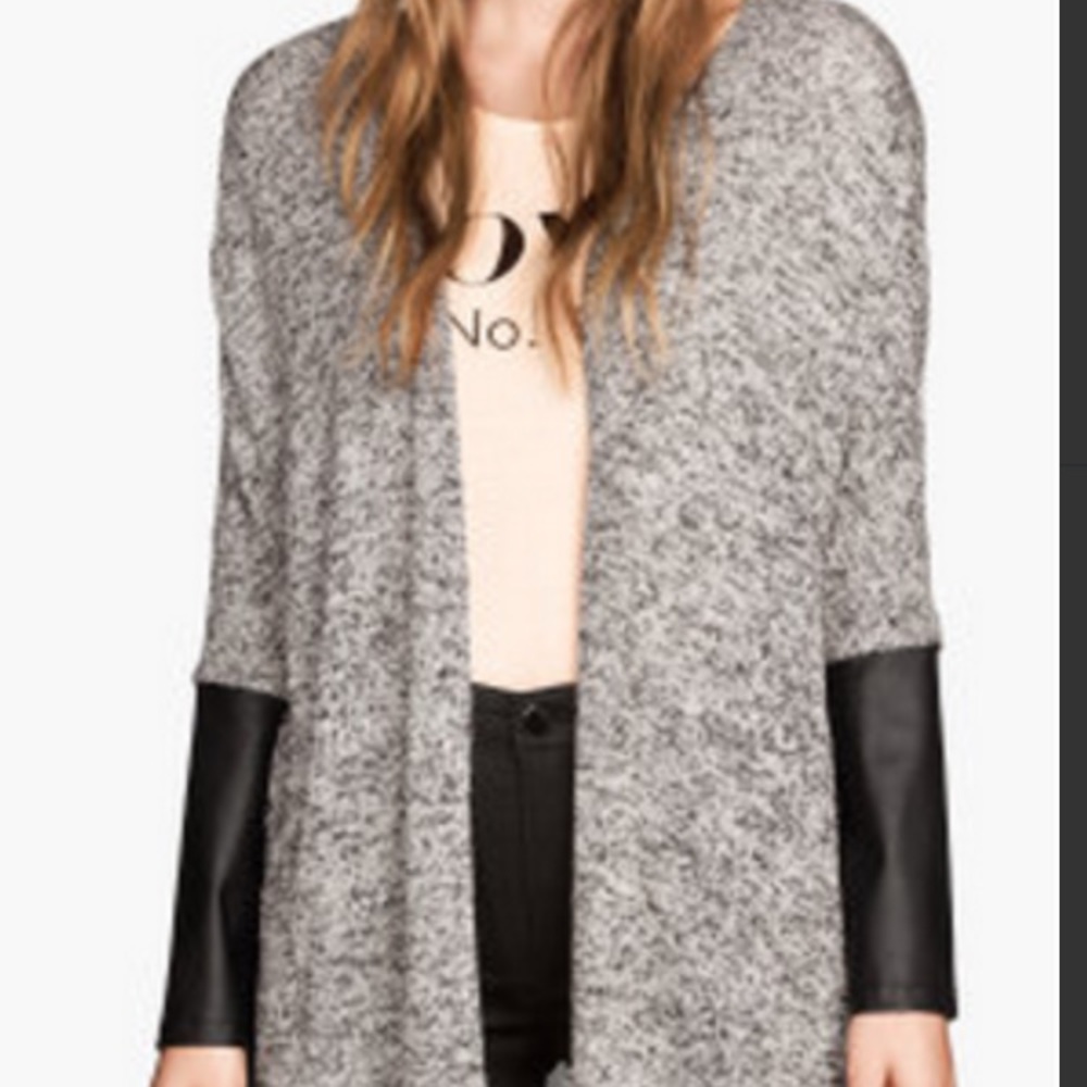 New Divided knit sweater with leather sleeve